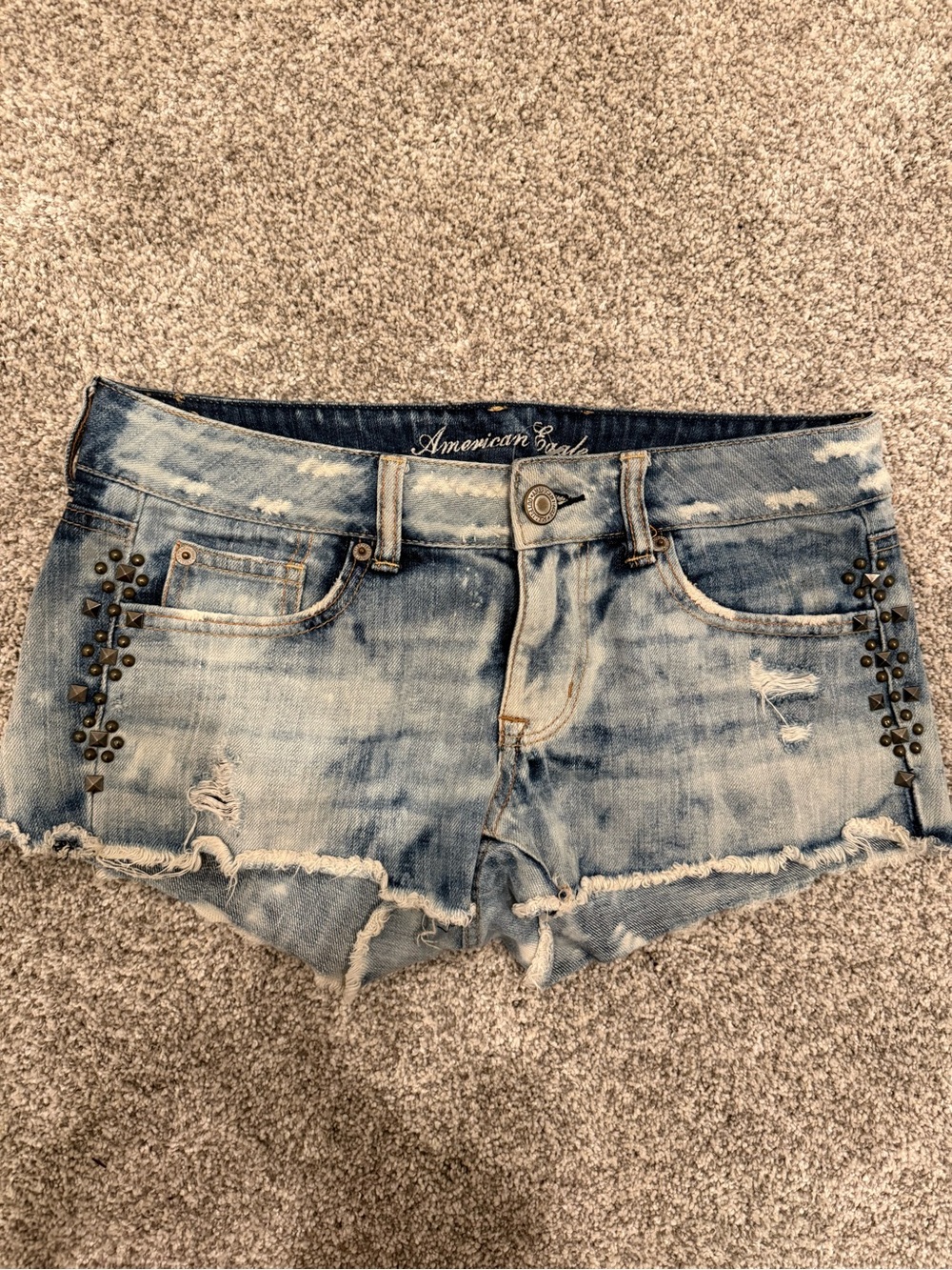 American Eagle Outfitters Faded Blue Denim Cutoff Shorts with Stud Accents
